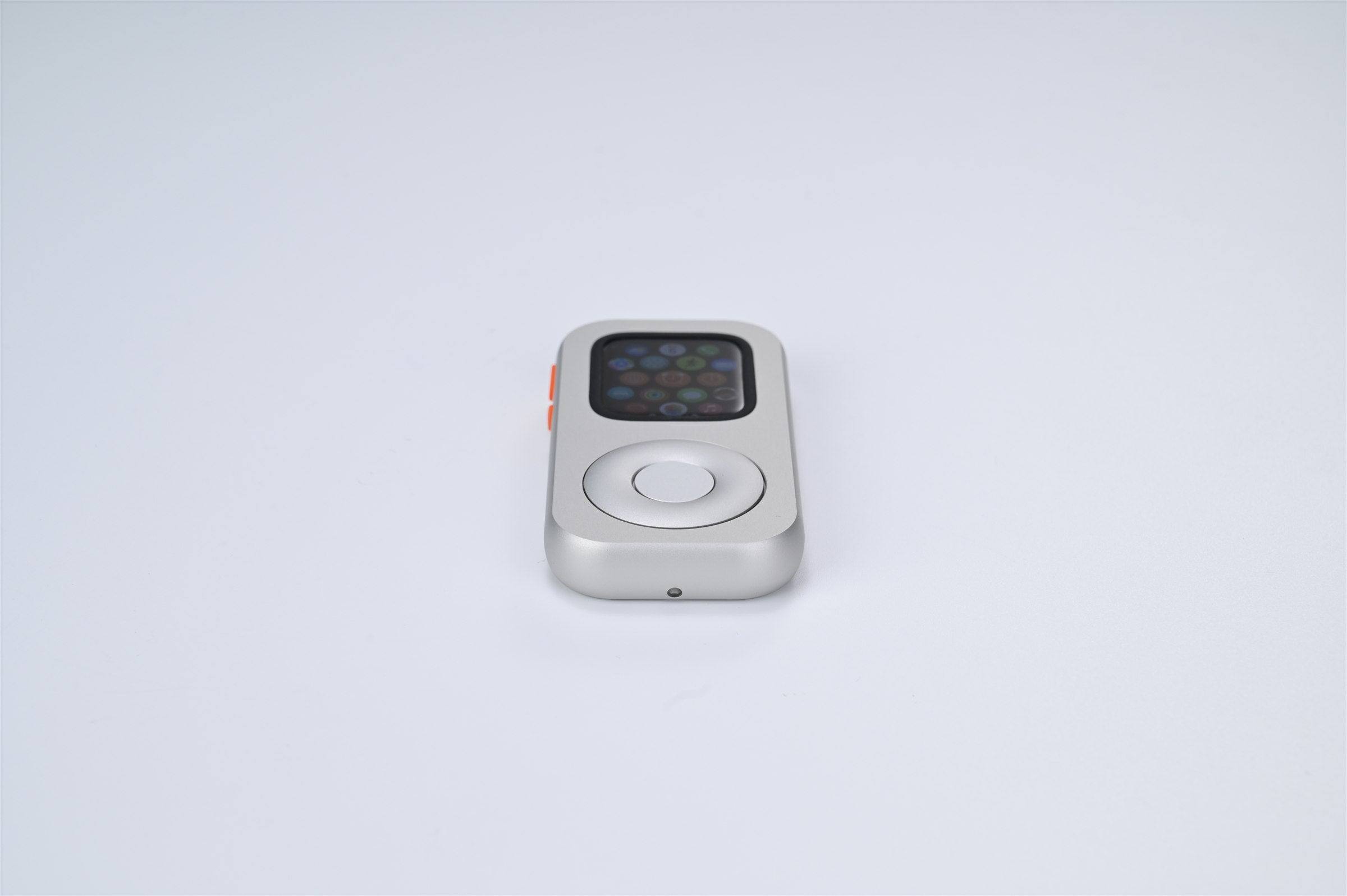Silver RePod C1 shown from the front with an Apple Watch app grid and scroll wheel visible